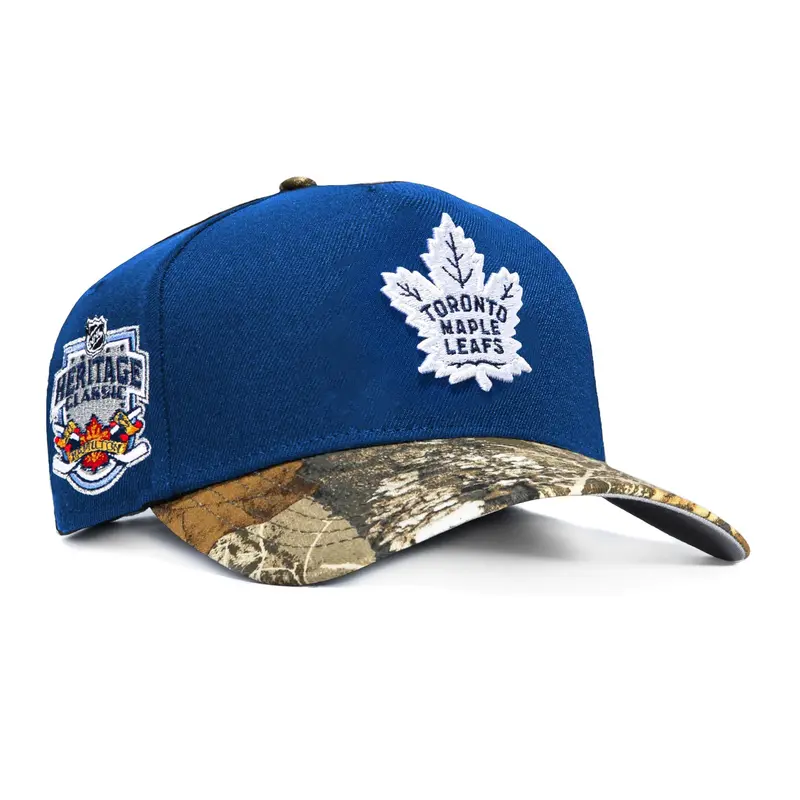 New Era 9Forty Toronto Maple Leafs 2022 Heritage Classic Realtree Visor Snapback – Royal/Realtree
